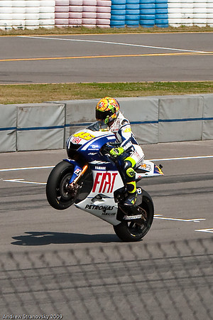 A Valentino Rossi Victory Wheelie at the 2009 Brno MotoGP. Everyone should try and see one of these...