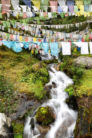 Prayer Flags over a Waterfall